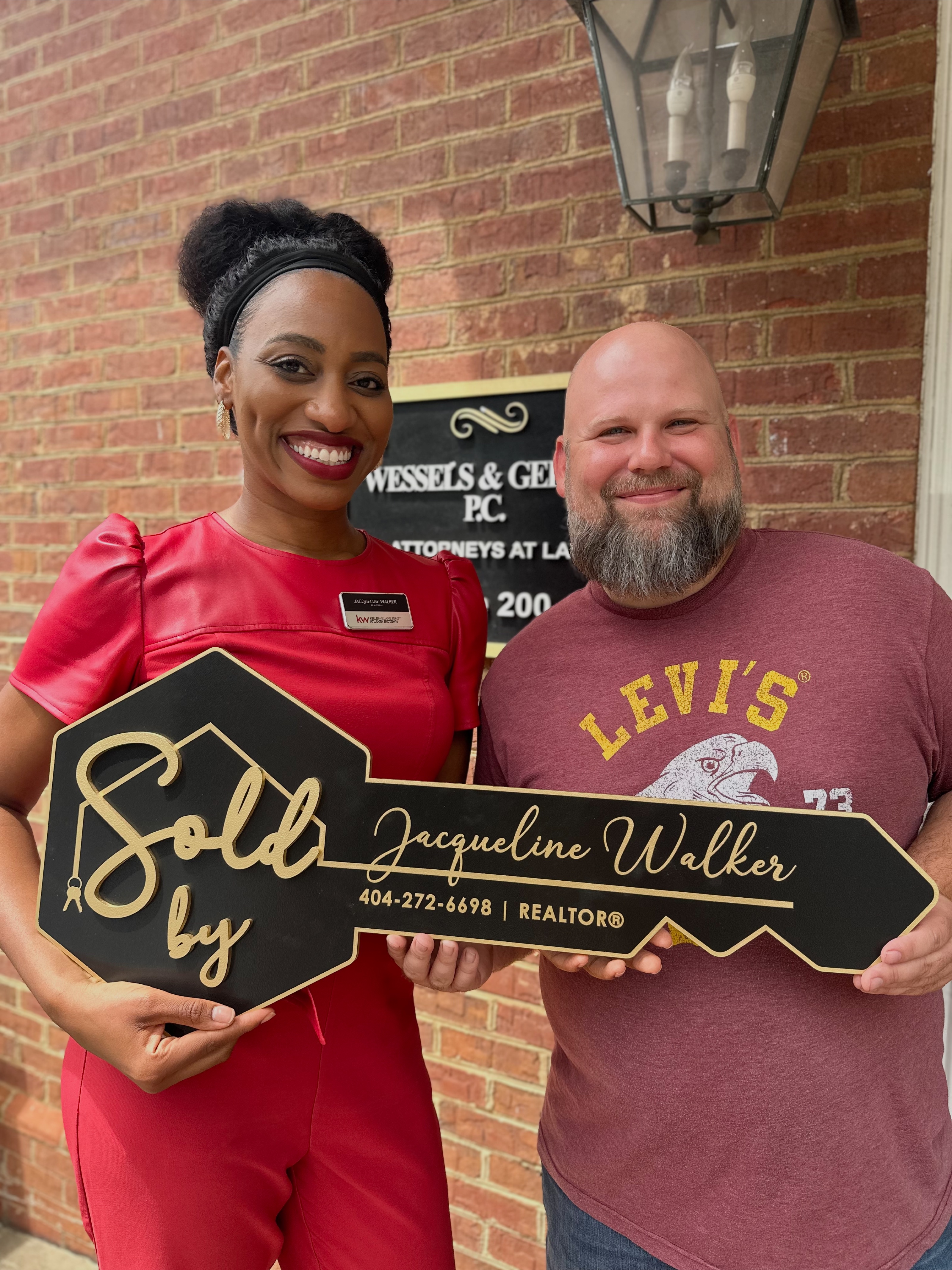 Jacqueline Walker with her seller at the closing table — Sold by Jacqueline Walker.